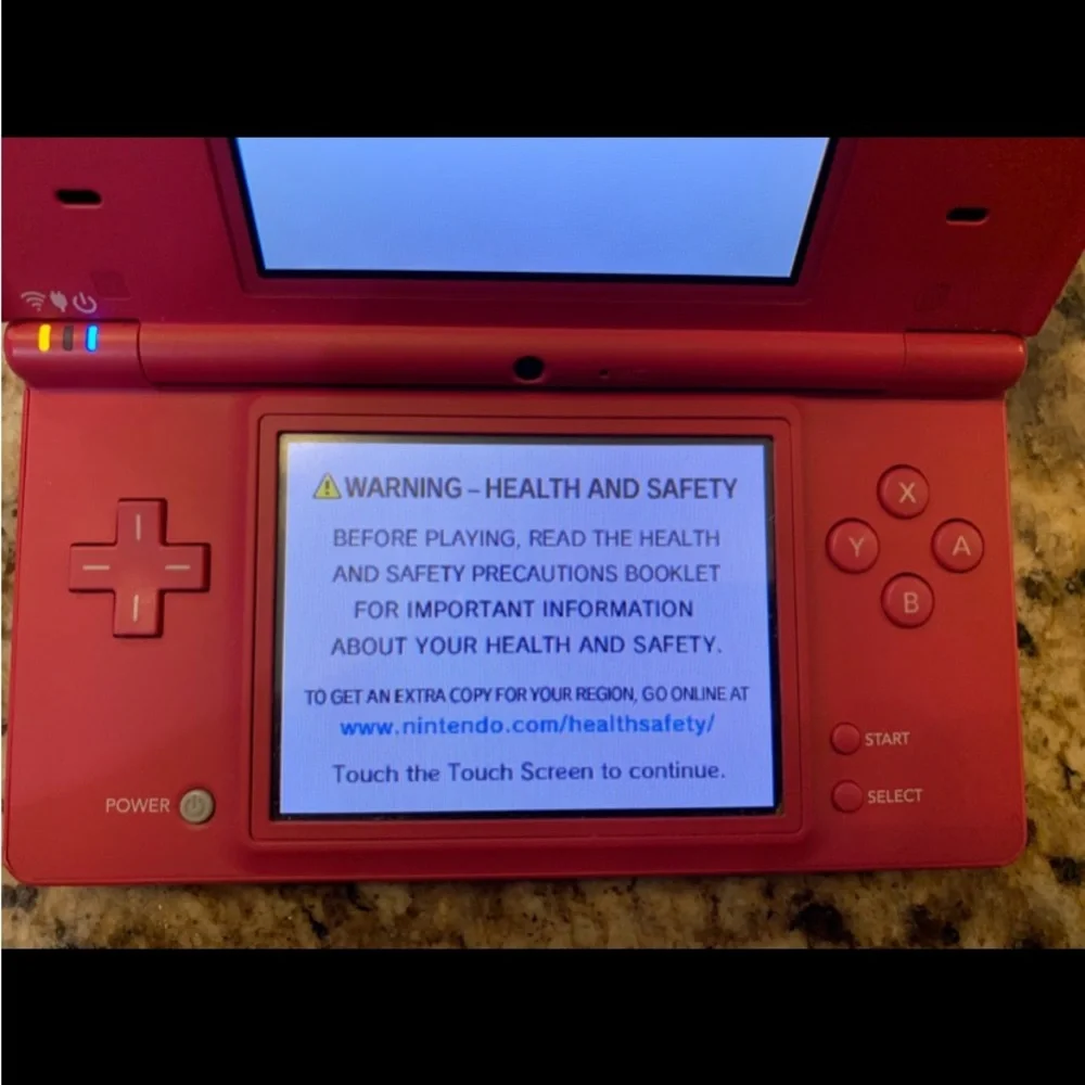 DS Pink Console, Stylus  Pen, Four (4) Games & Charger